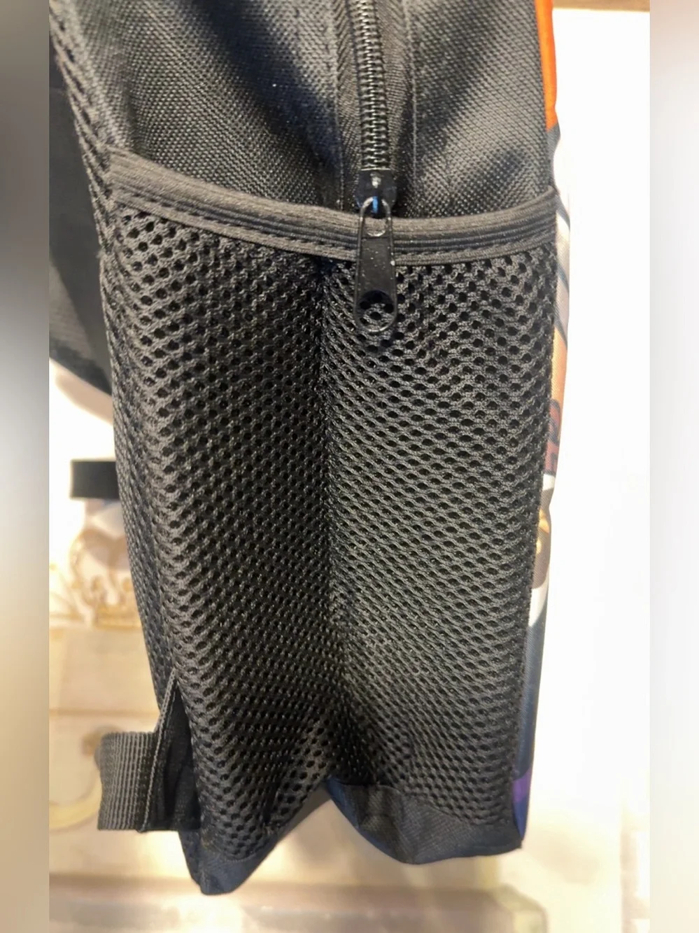 Bold Backpack, Graphic Print, Shark  Mouth, A Hand Pouring Liquid